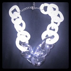 White and silver necklace. Never worn!!
